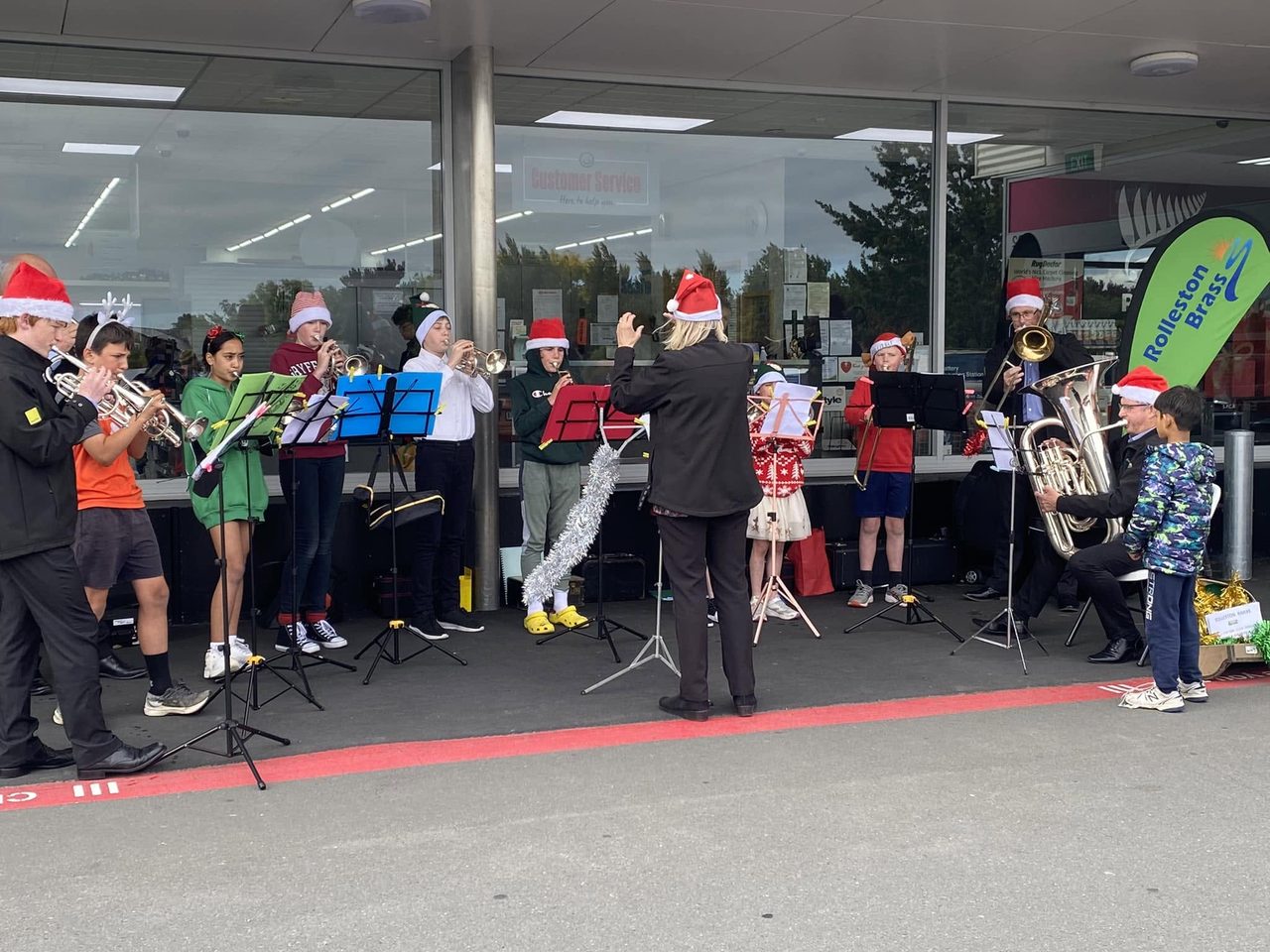 Rolleston Brass Academy young players performing in Christmas hats