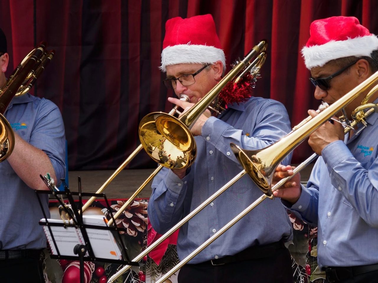Rolleston Brass trombone section swinging Christmas carols
