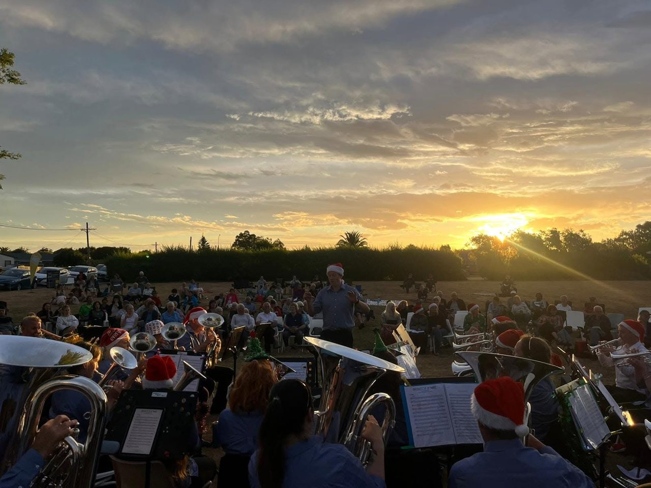 Rolleston Brass playing carols by candlelight